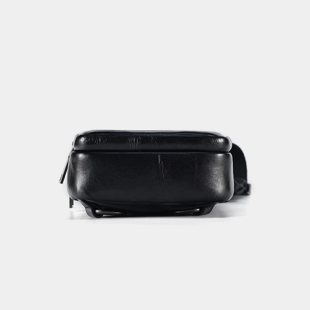 Compact black leather sling bag