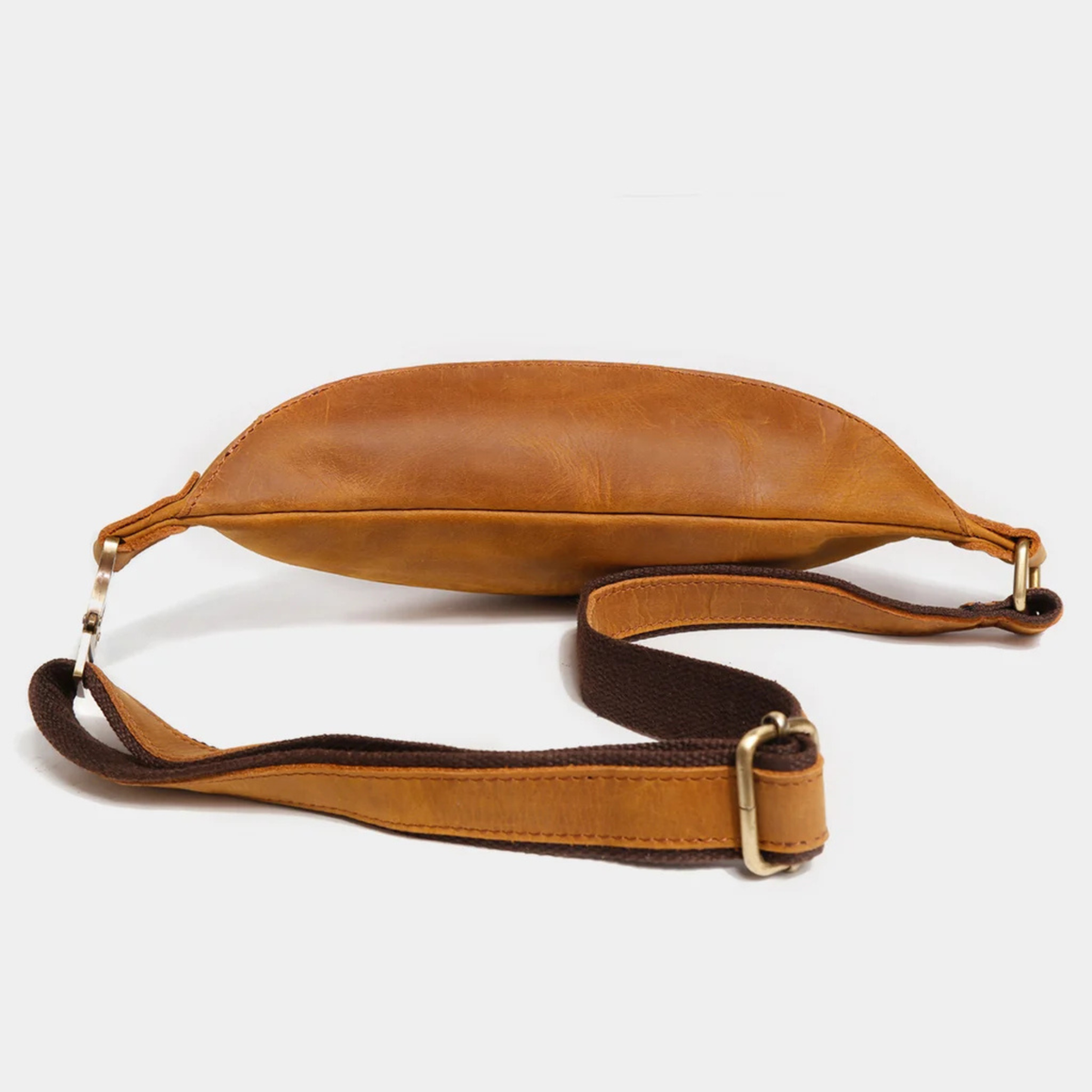Tan leather crossbody bag side view