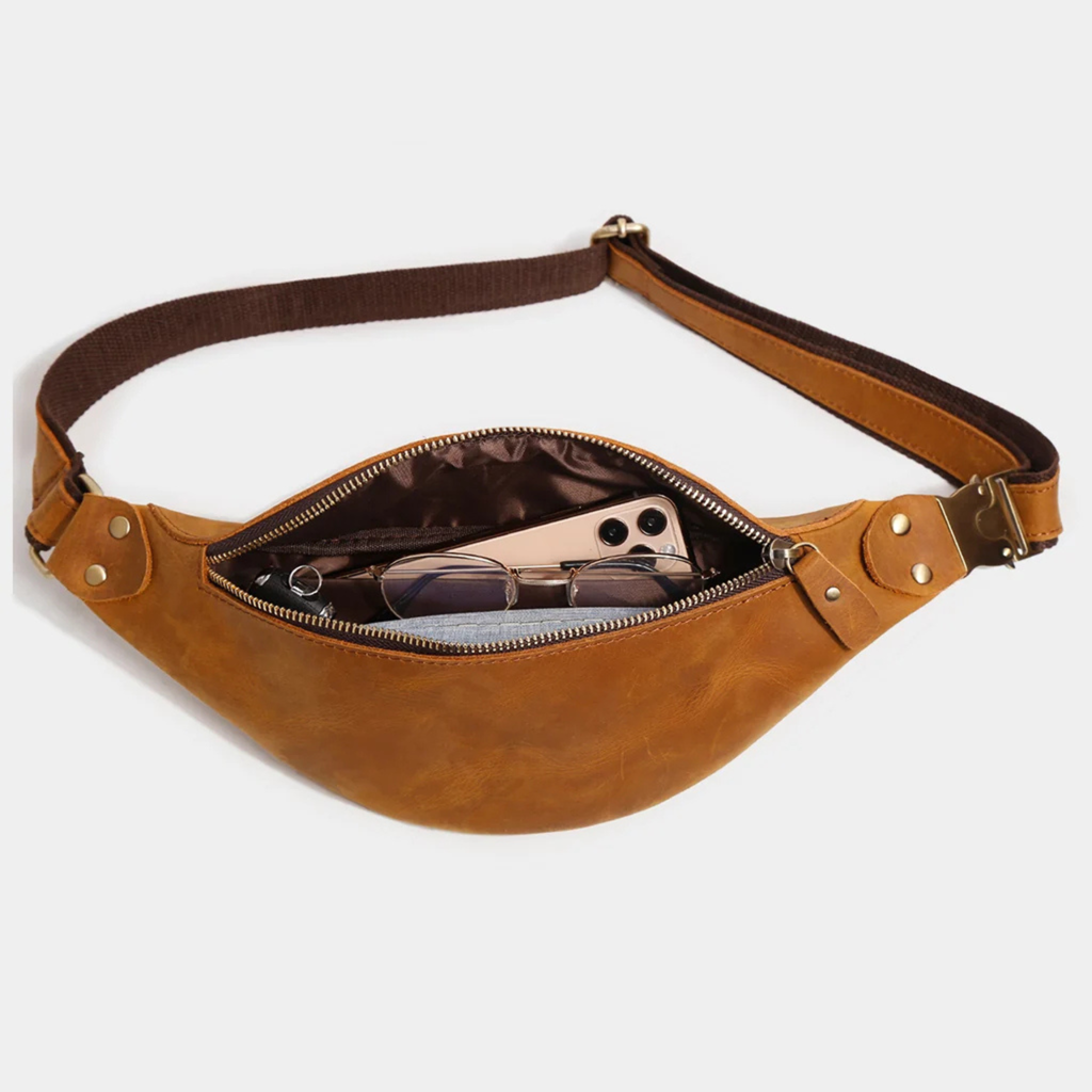 Tan leather sling bag with zipper compartment