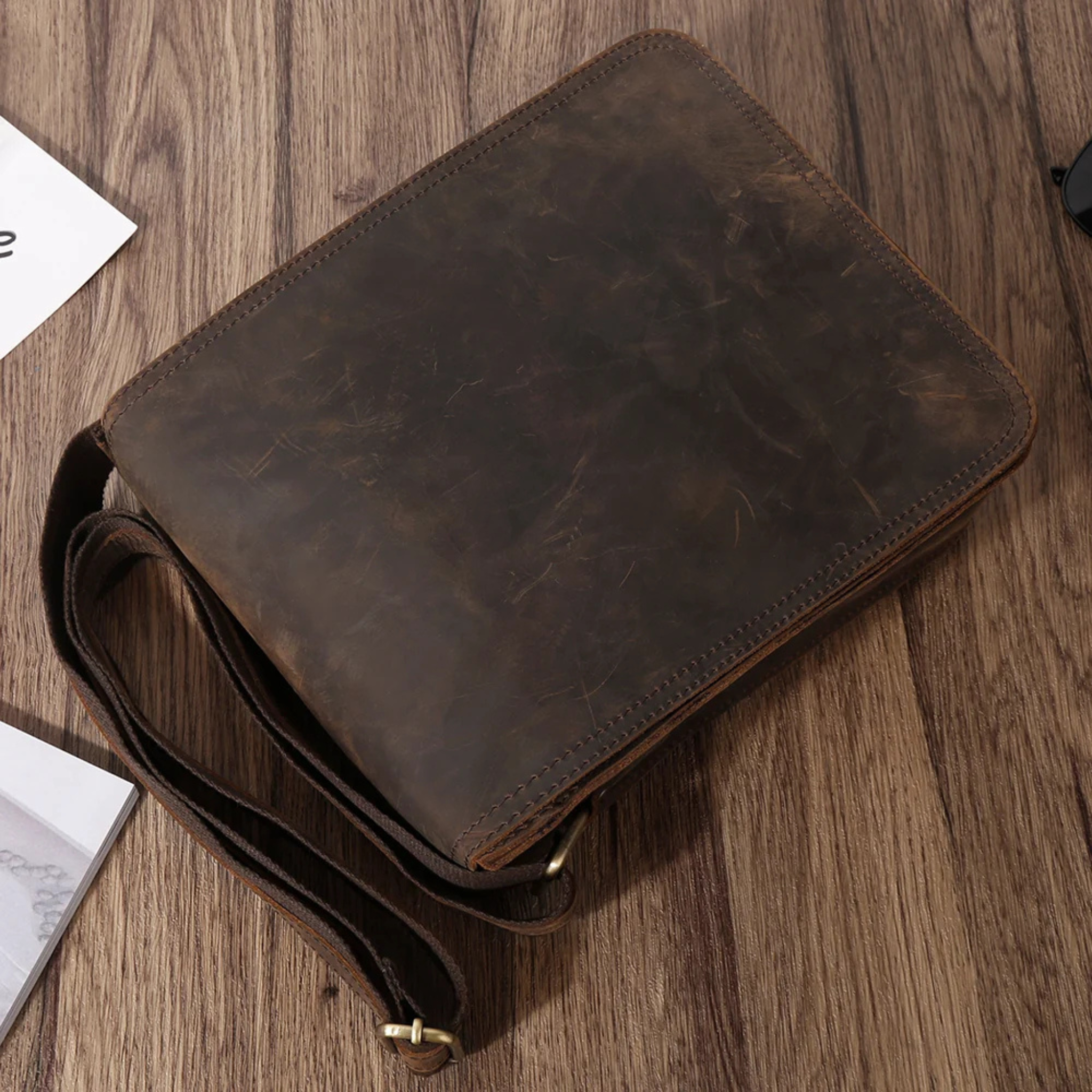 Dark Brown leather shoulder bag bottom and strap detail
