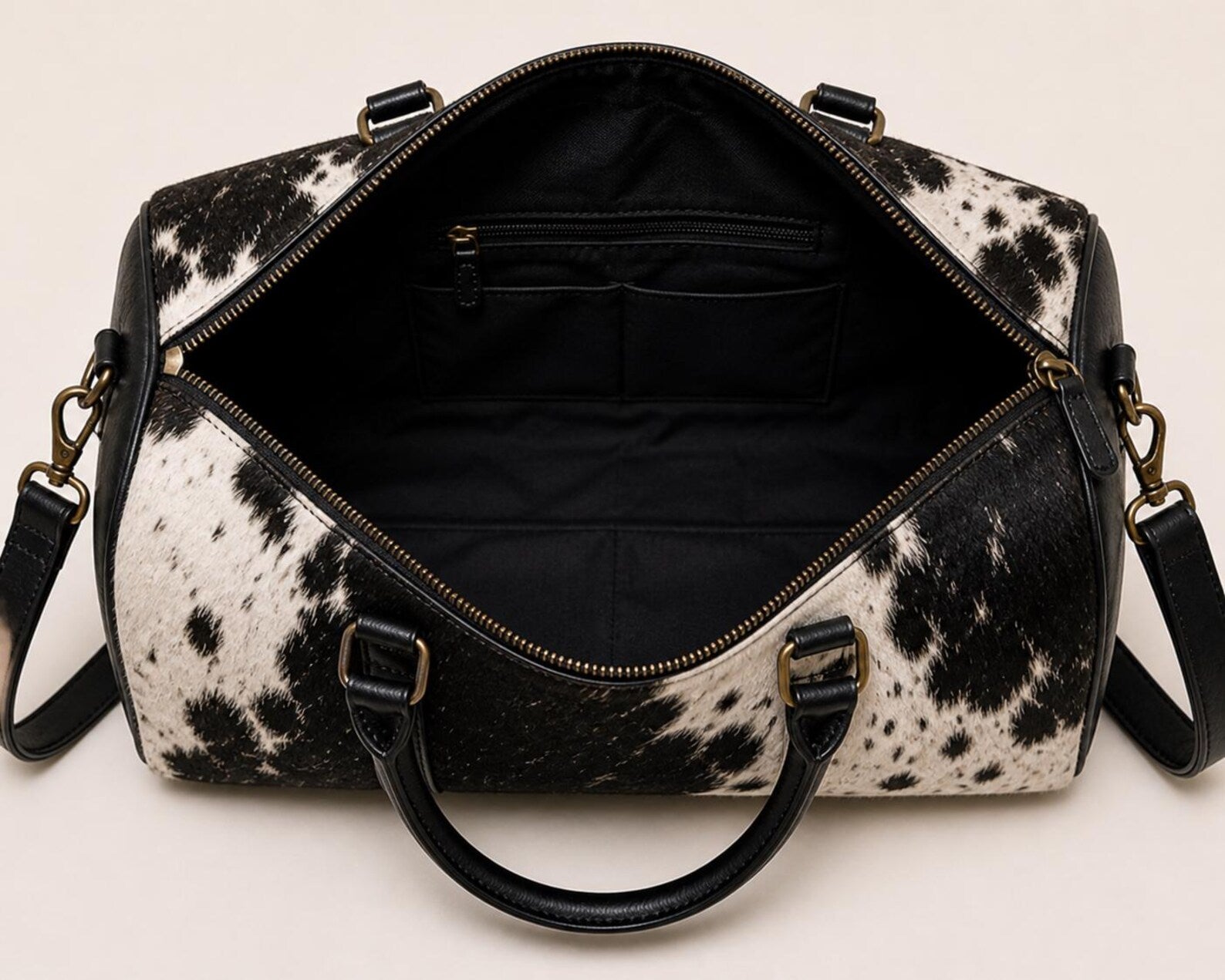 Handmade Cowhide Leather Duffle Bag – Hair On Hide Travel Weekender - The Leather Syndicate