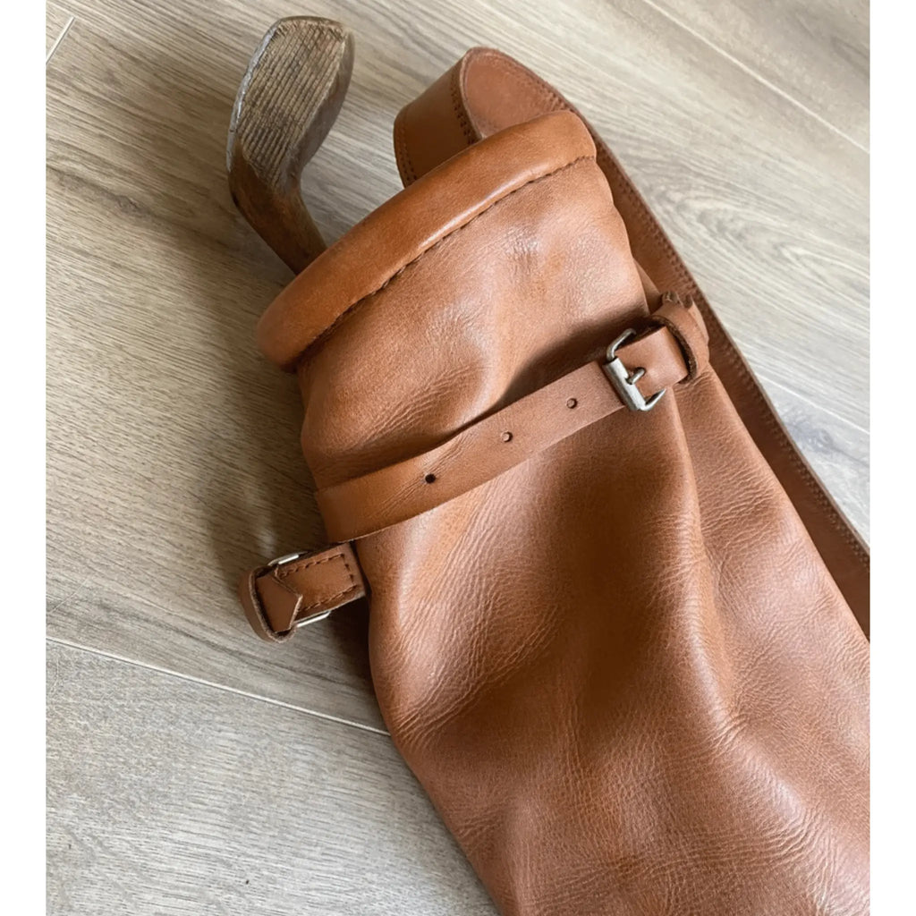Close-up of genuine cowhide leather texture on handmade golf bag