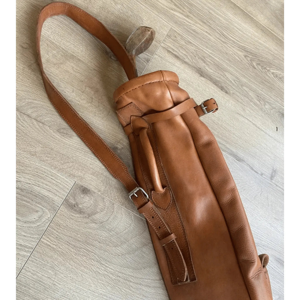 Side profile of handmade cowhide leather golf bag with shoulder strap